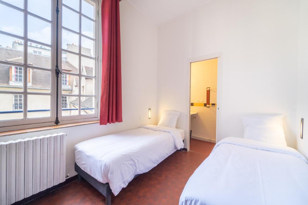 Mije Marais Hostel Paris Exterior foto A typical room at the hostel
