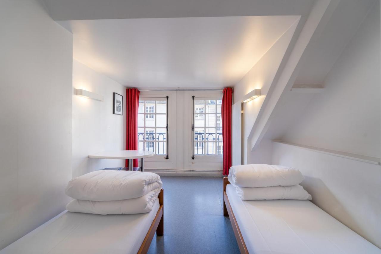 Mije Marais Hostel Paris Exterior foto A typical room at the hotel